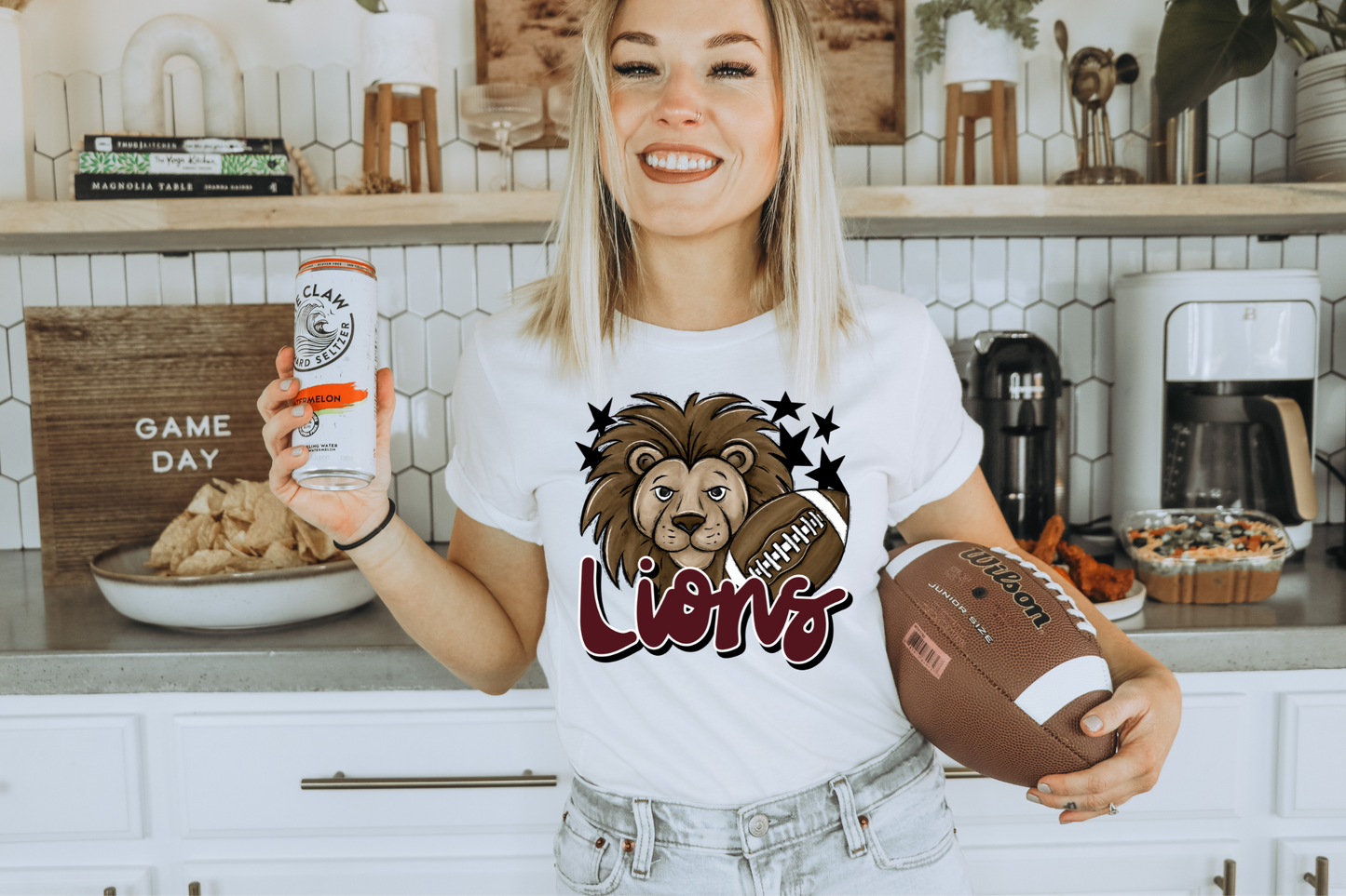 Lions with mascot- maroon letters