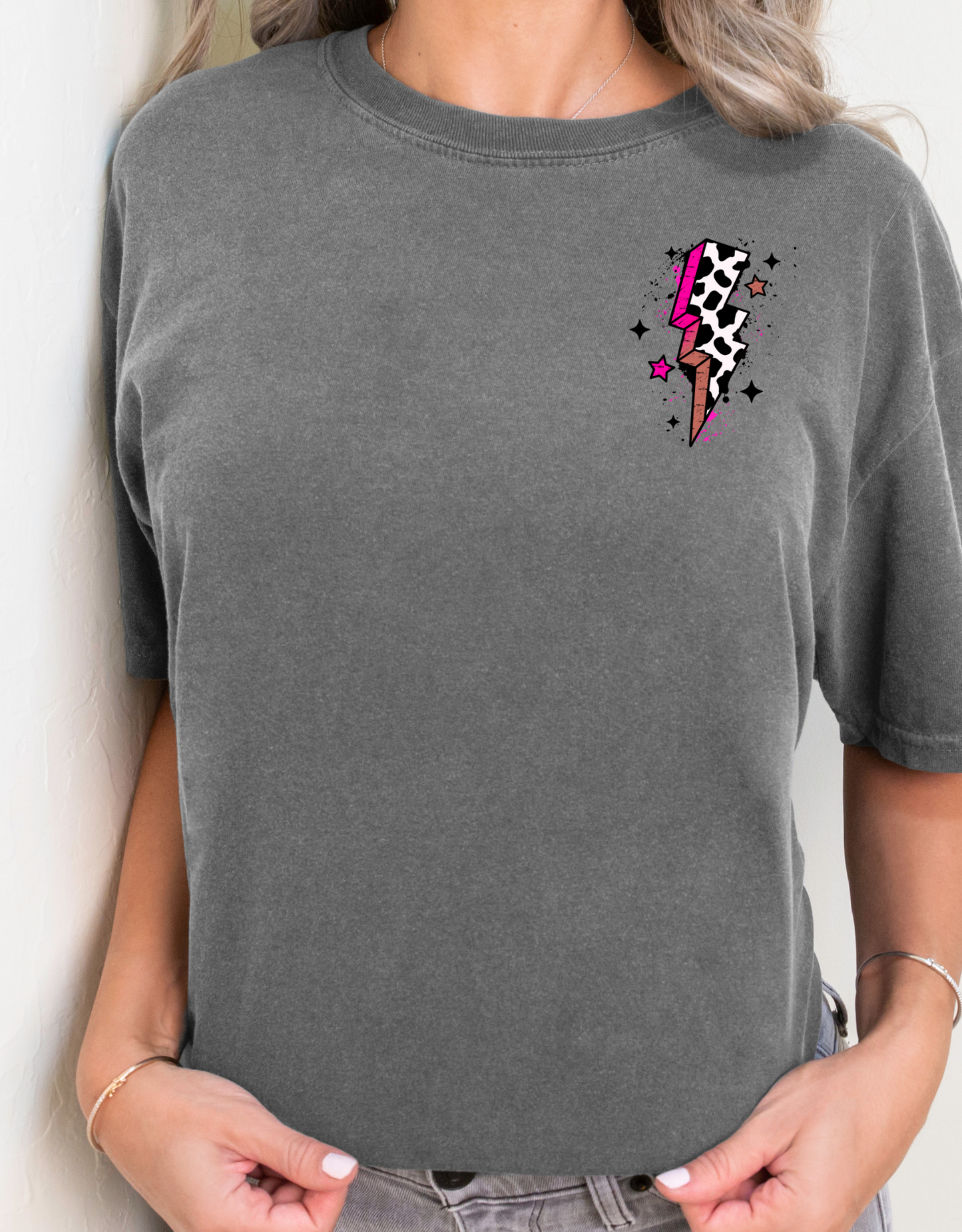 Cow print lightning with stars and sparkle