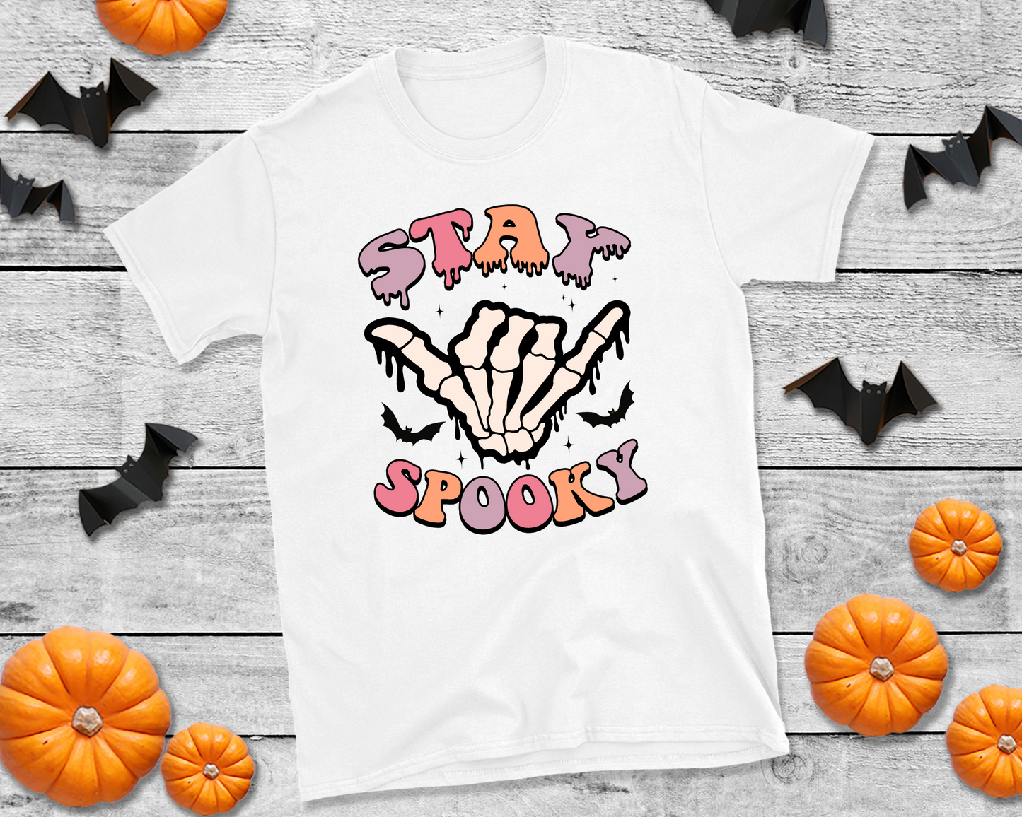 Stay spooky, skeleton hand black drip