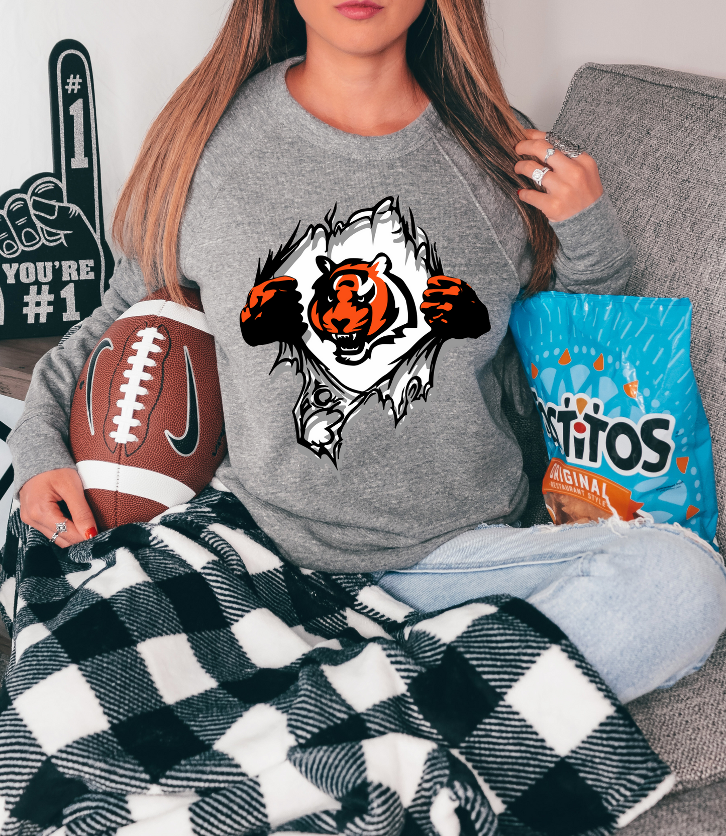 Bengal's mascot in chest tear