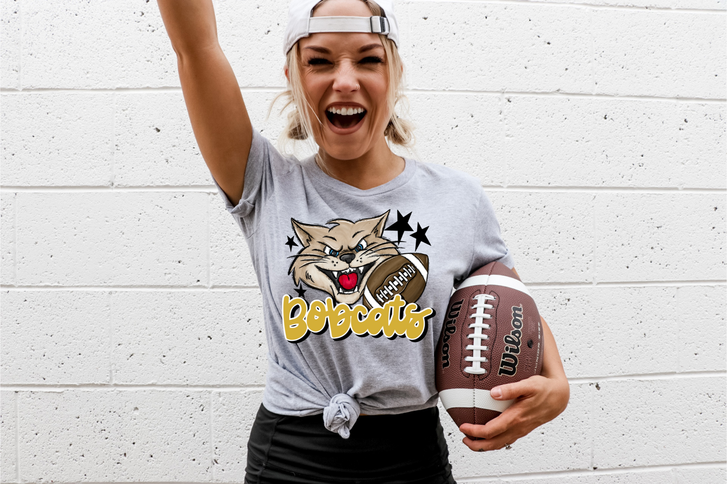 Bobcats with mascot- yellow letters