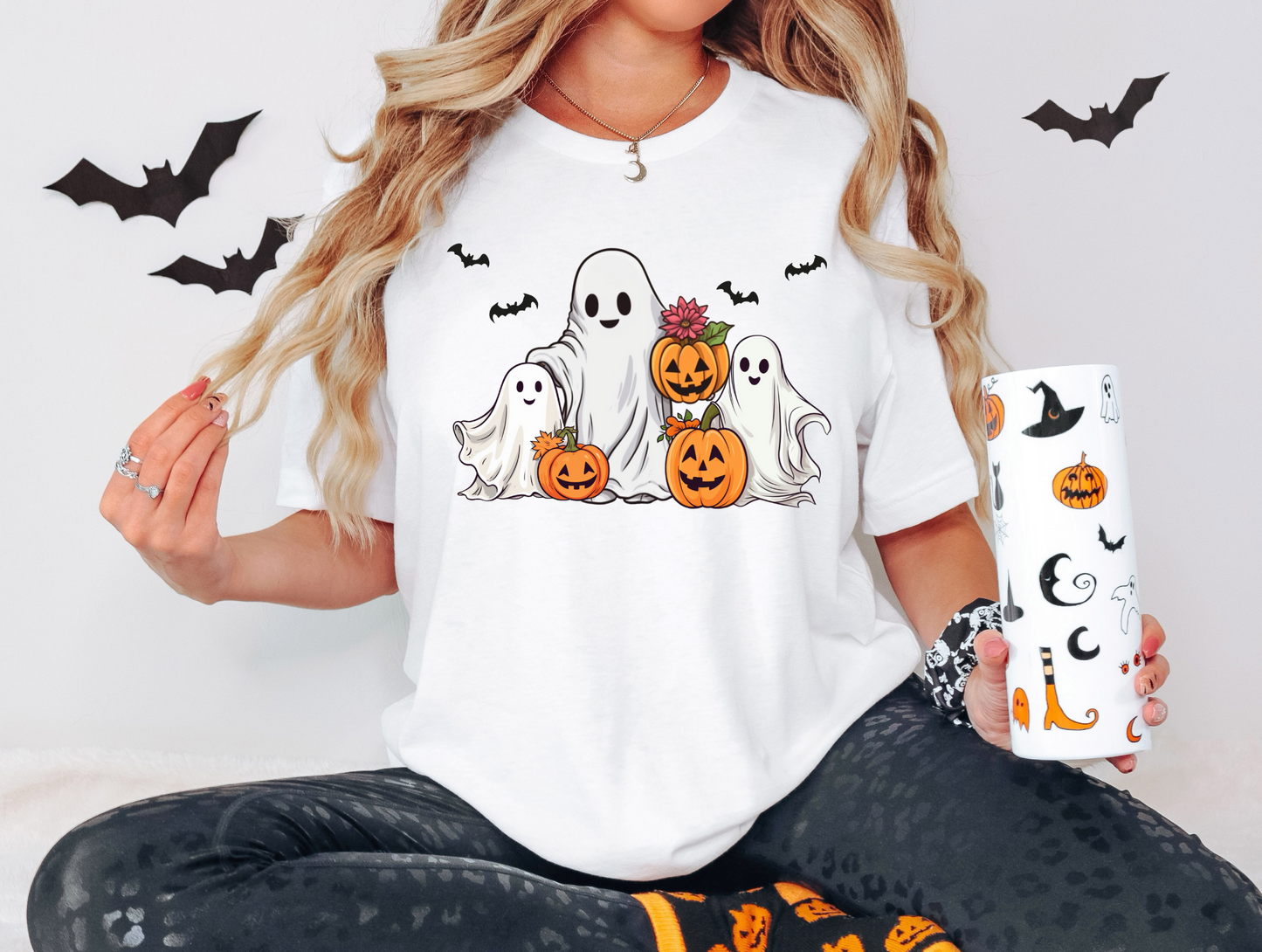 Ghosts with pumpkins and bats
