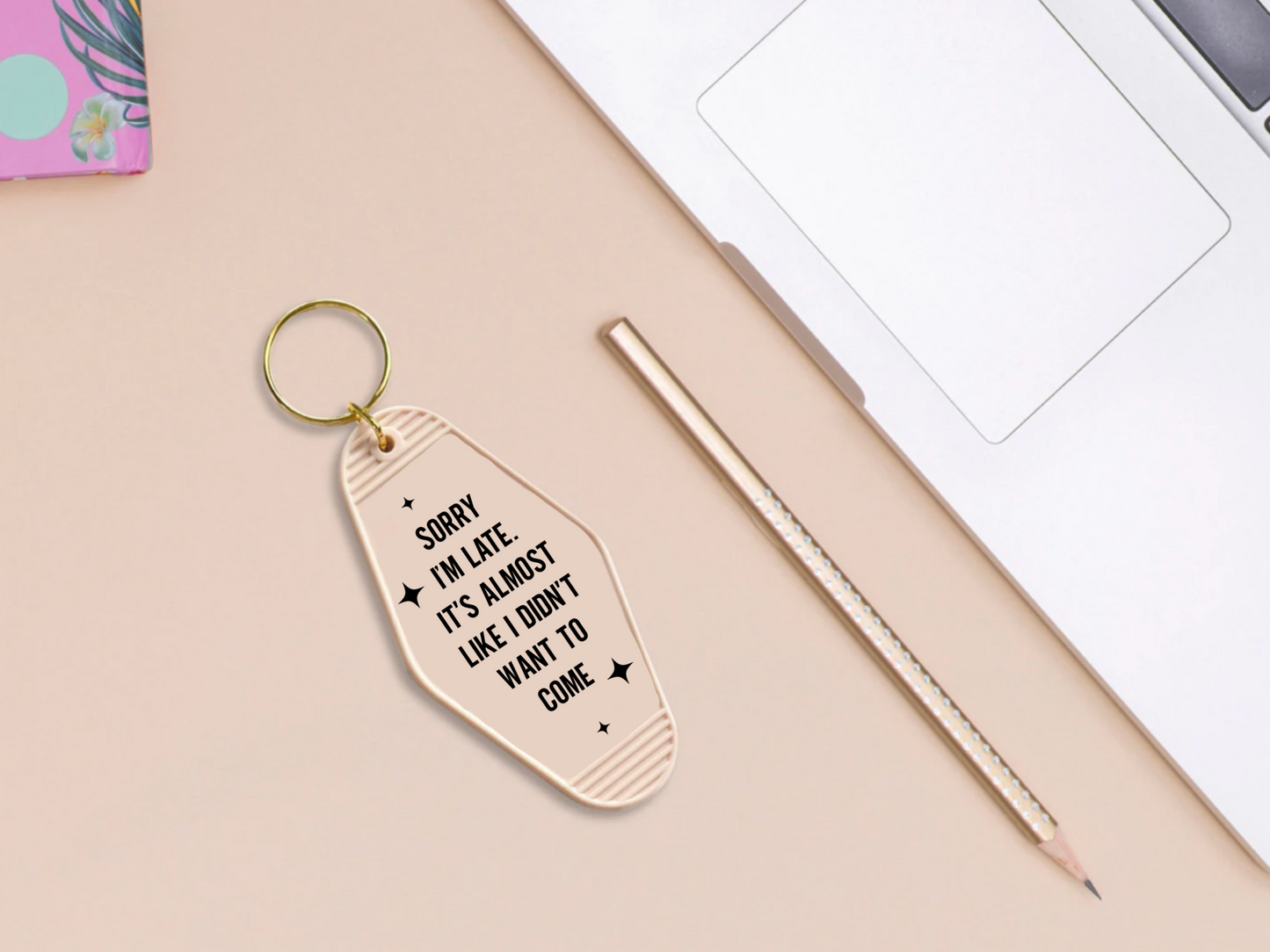 Sorry I'm late it's almost like I didn't want to come - Motel keychain