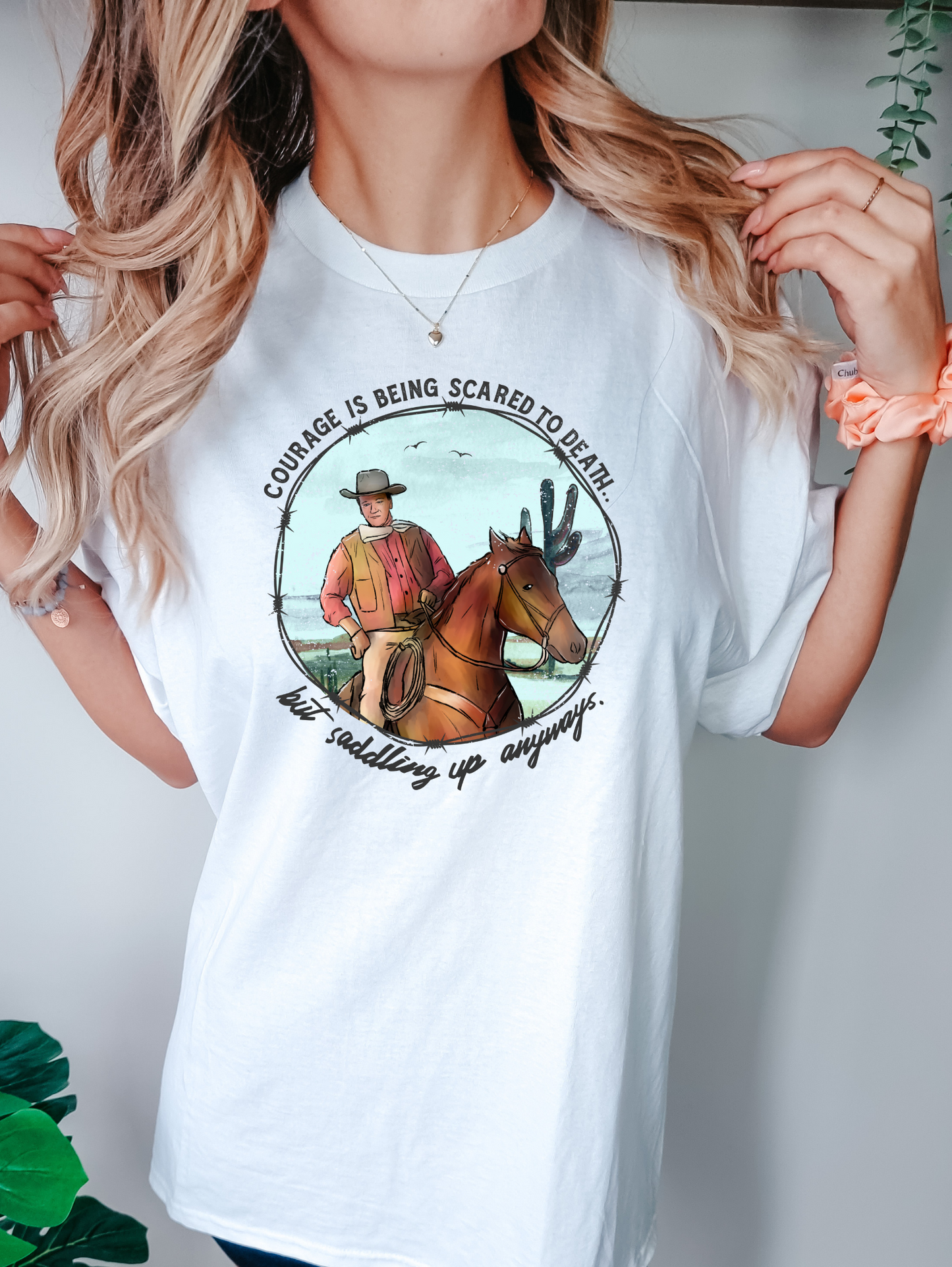 Courage is being scared to death but saddling up anyways