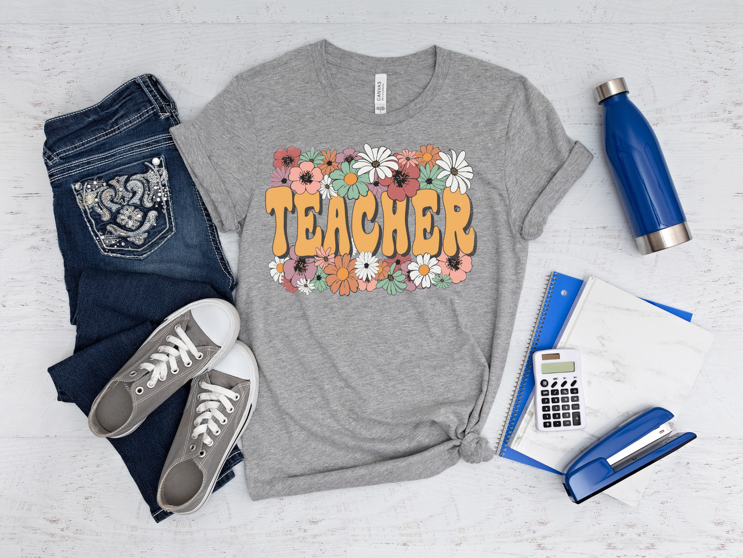 Teacher surrounded by flowers