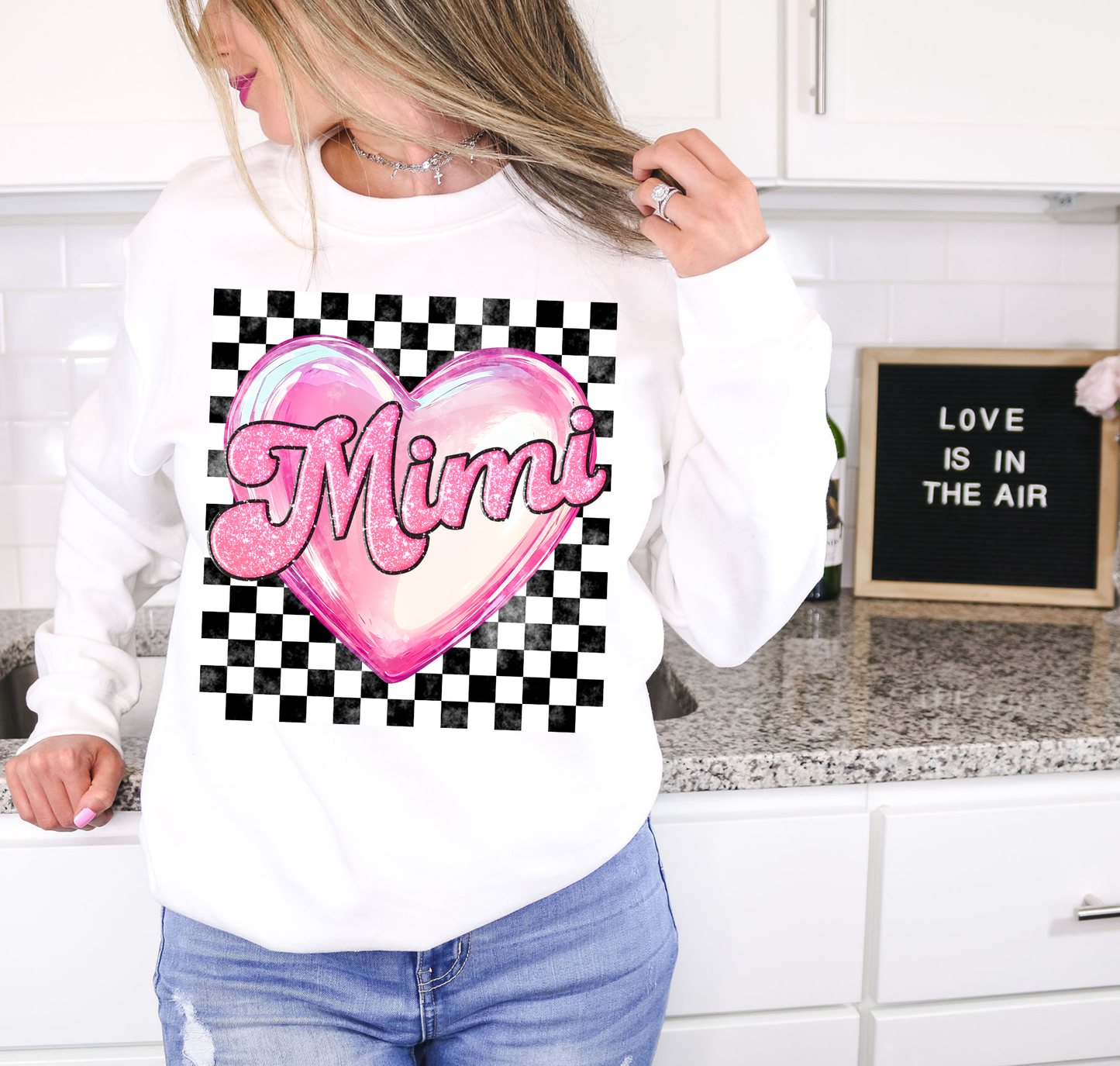 Mimi Glossy Heart With Black And White Checkered Background
