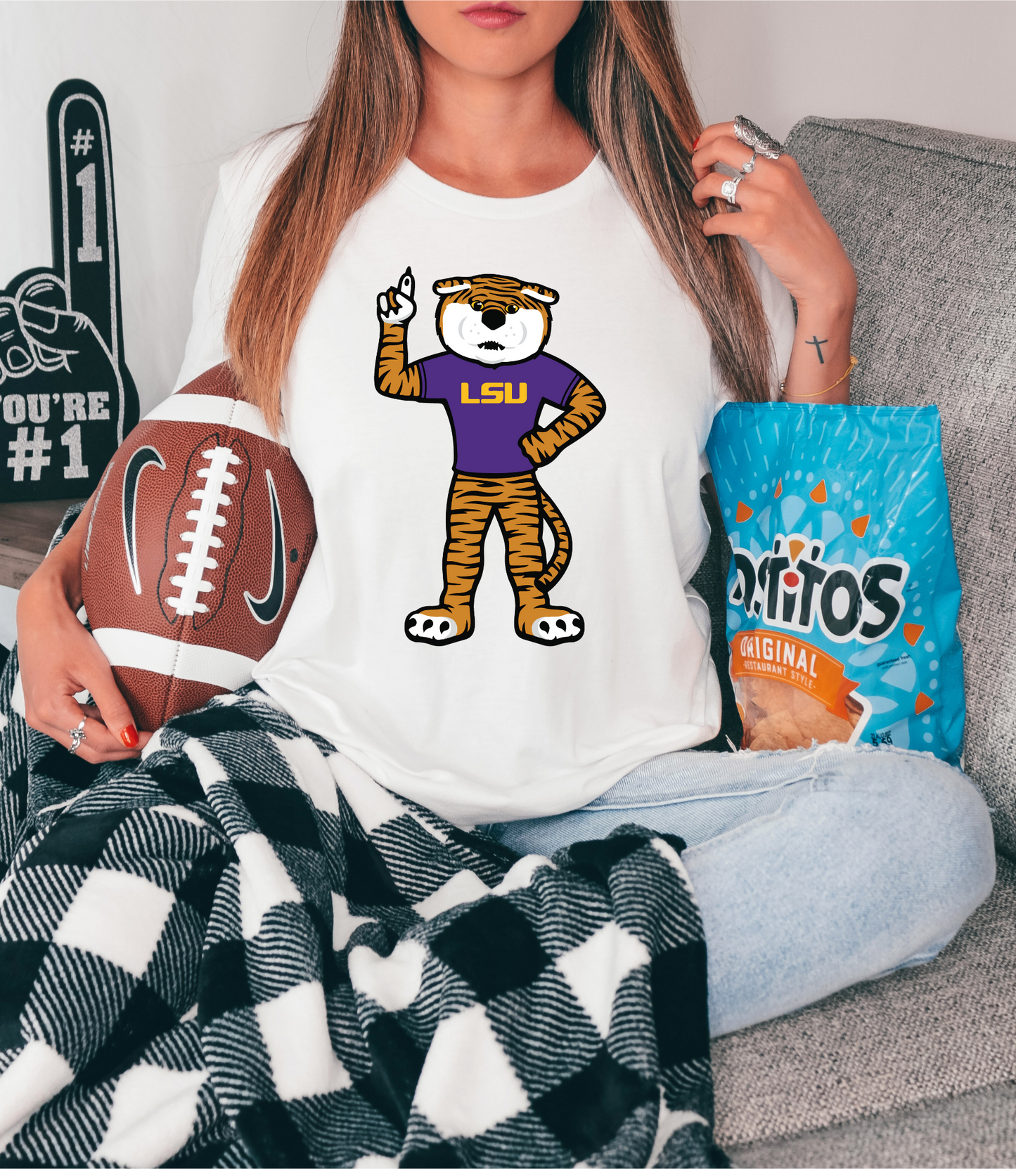 LSU tiger in purple shirt