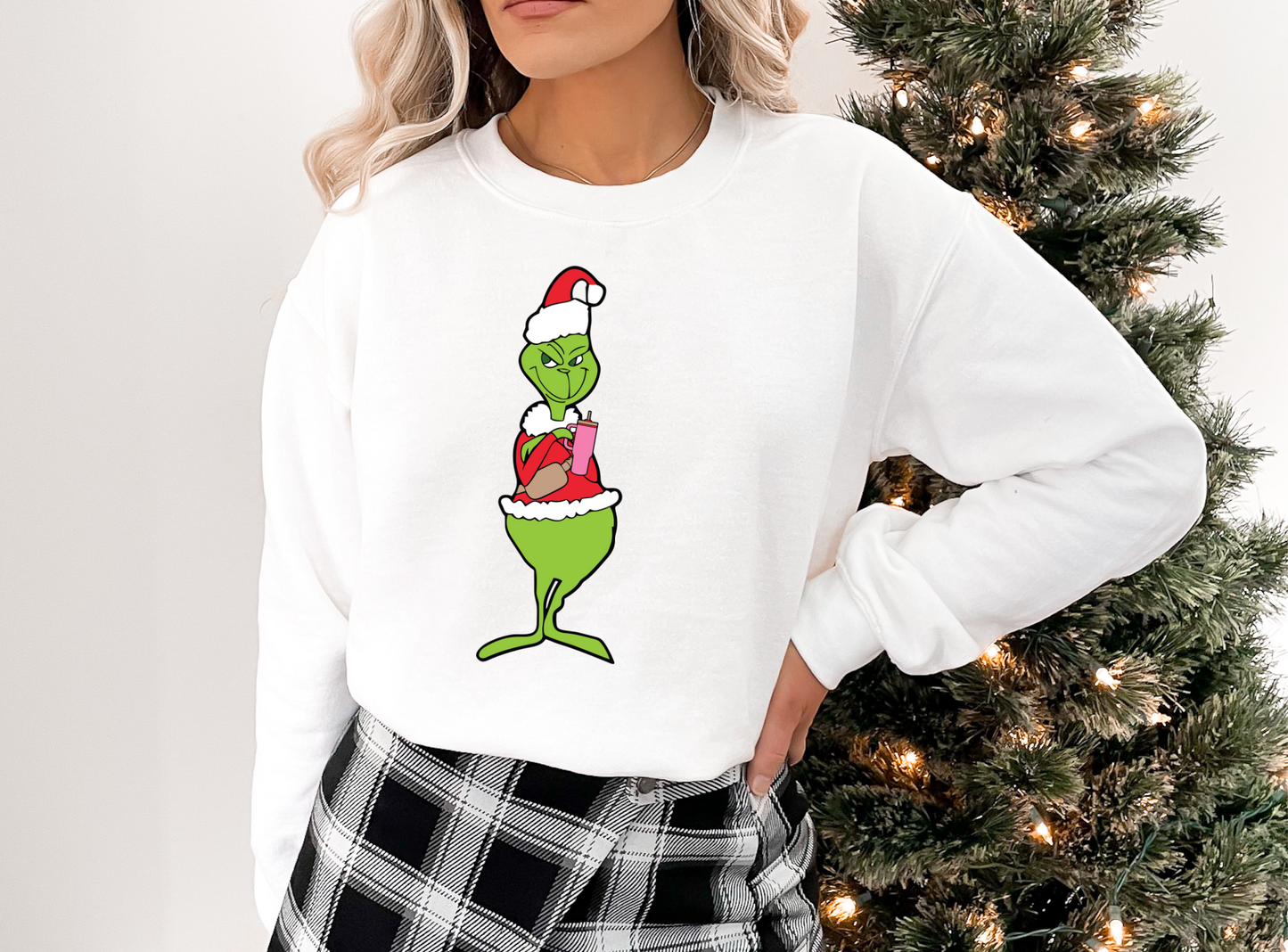 Grinch in Santa suit with iced coffee - facing forward