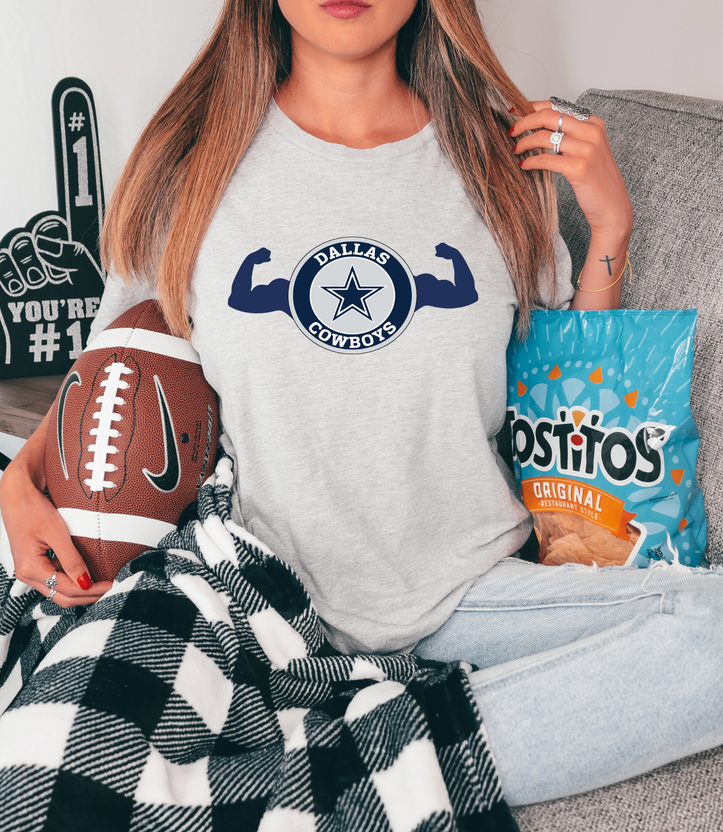 Dallas Cowboys with flexing arms