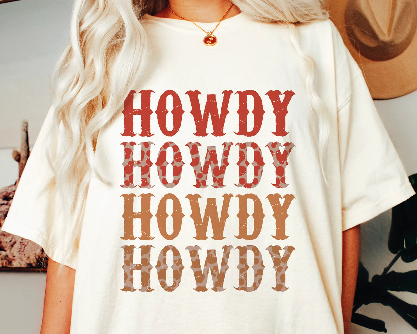 Howdy, red and orange cow print