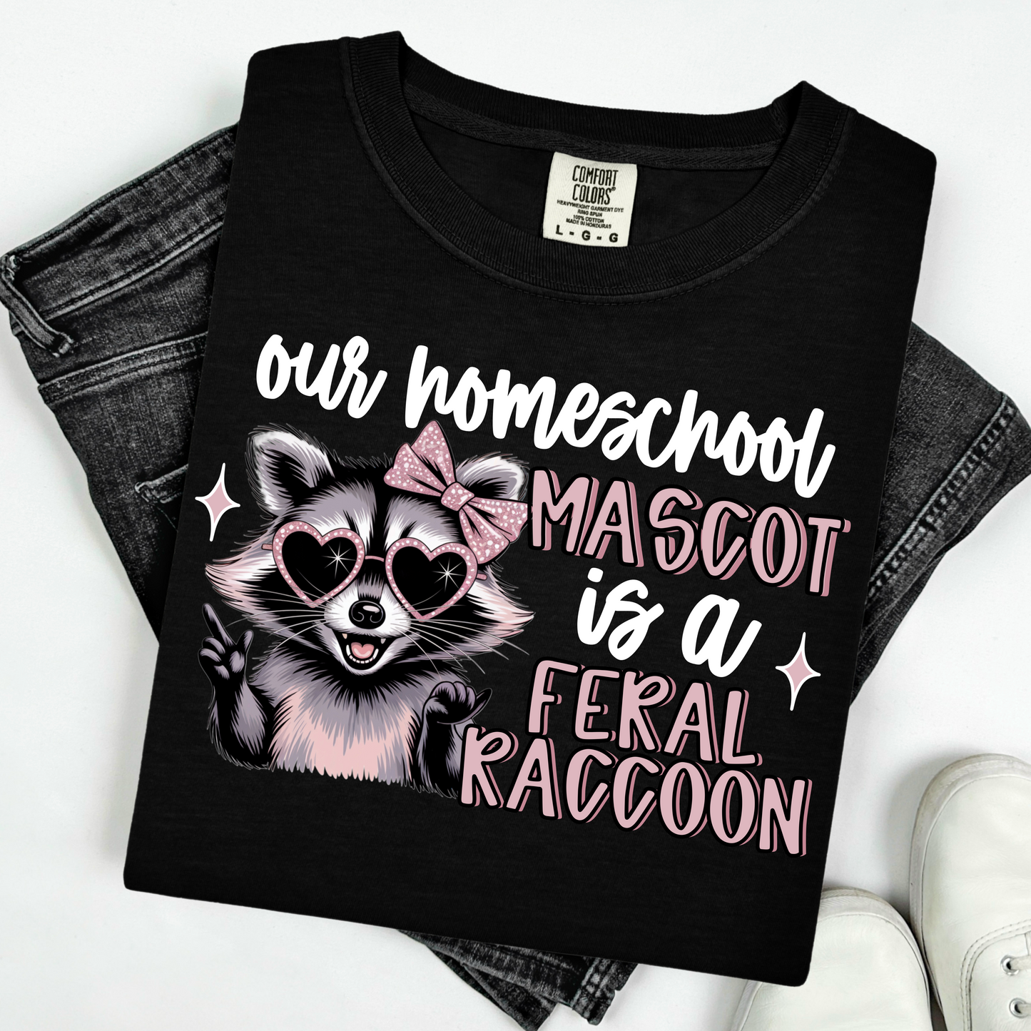 Our homeschool mascot is a feral raccoon (white)