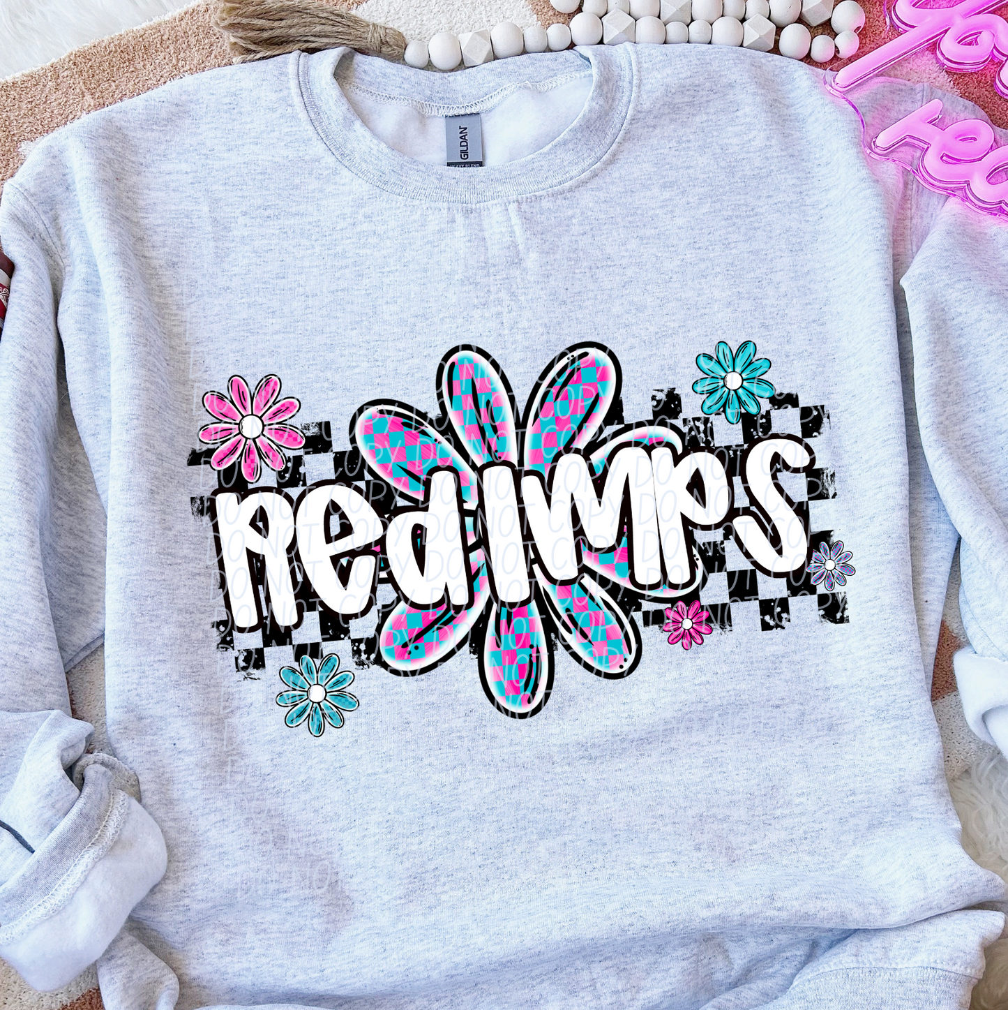 Red Imps (checker flower mascots)