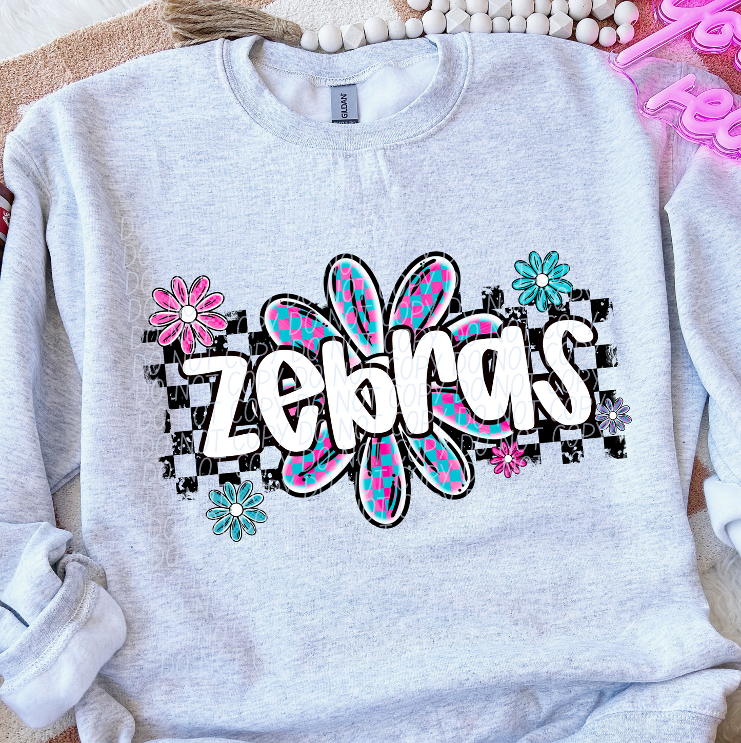 Zebras (checker flower mascots)