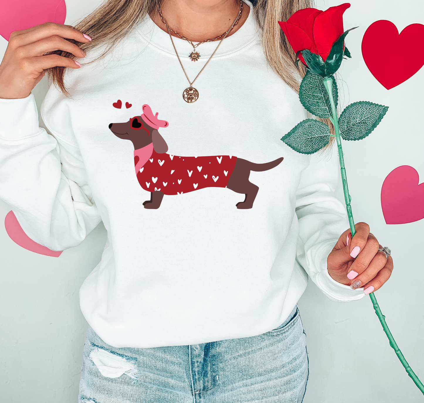 Dog With Red Sweater And Pink Hat And Hearts