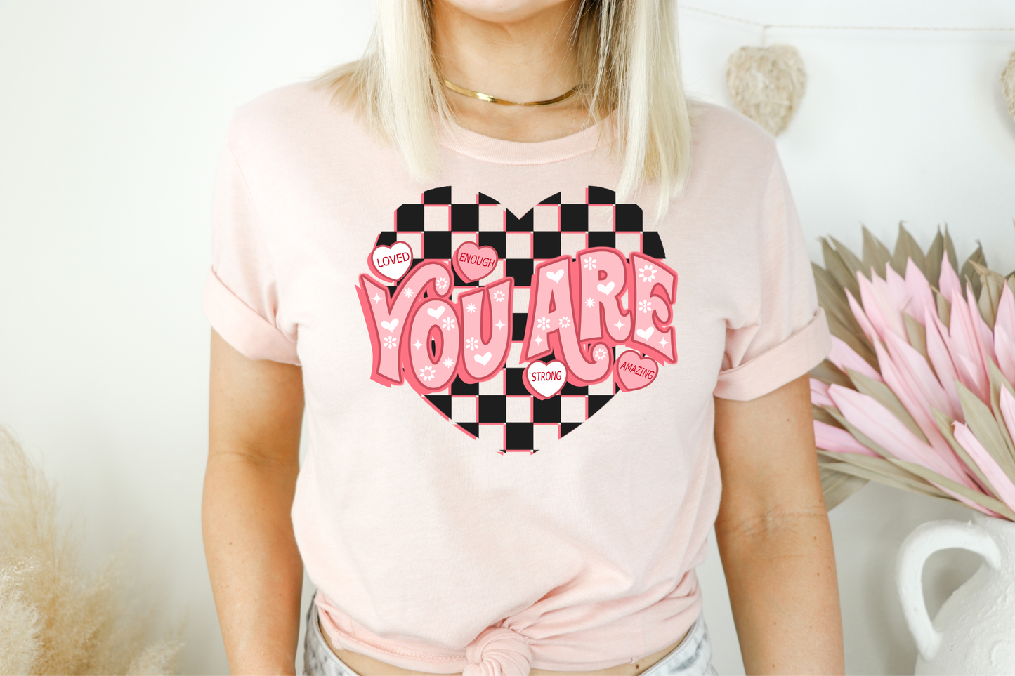 You are- loved, Enough, Strong, Amazing hearts with checkered background