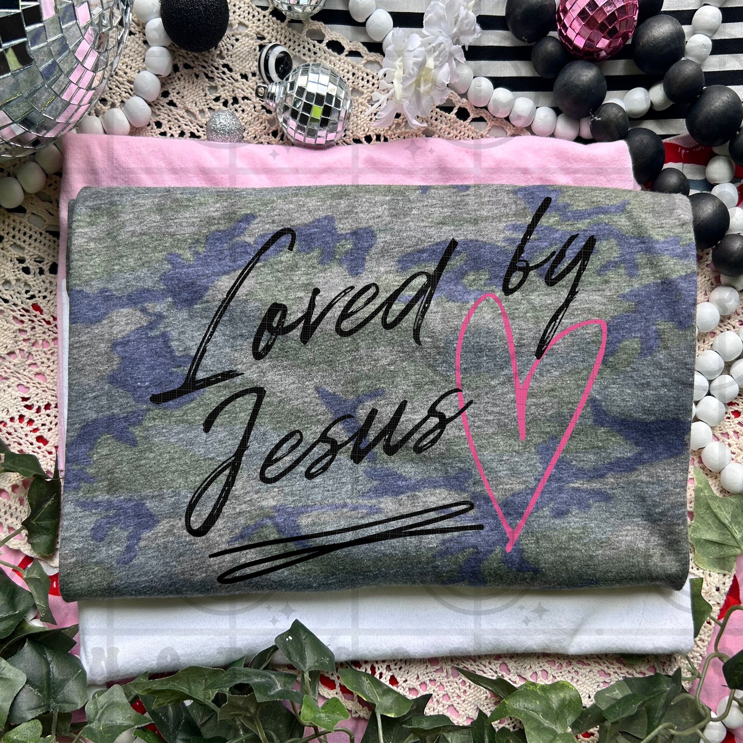 LOVED BY JESUS