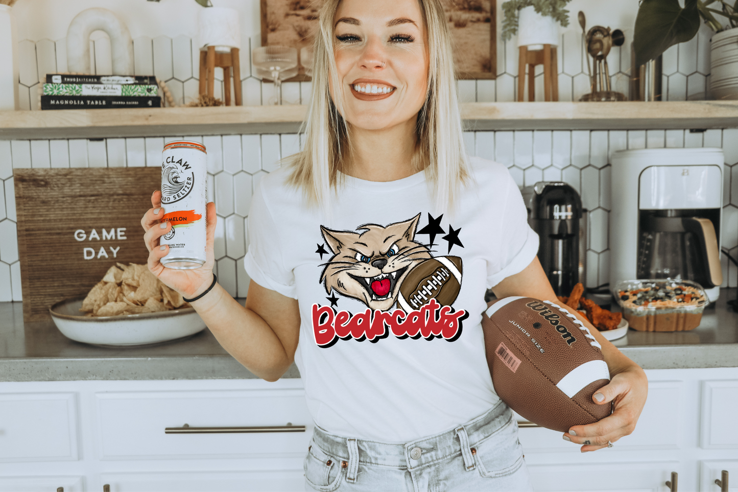 Bearcats with mascot- red letters