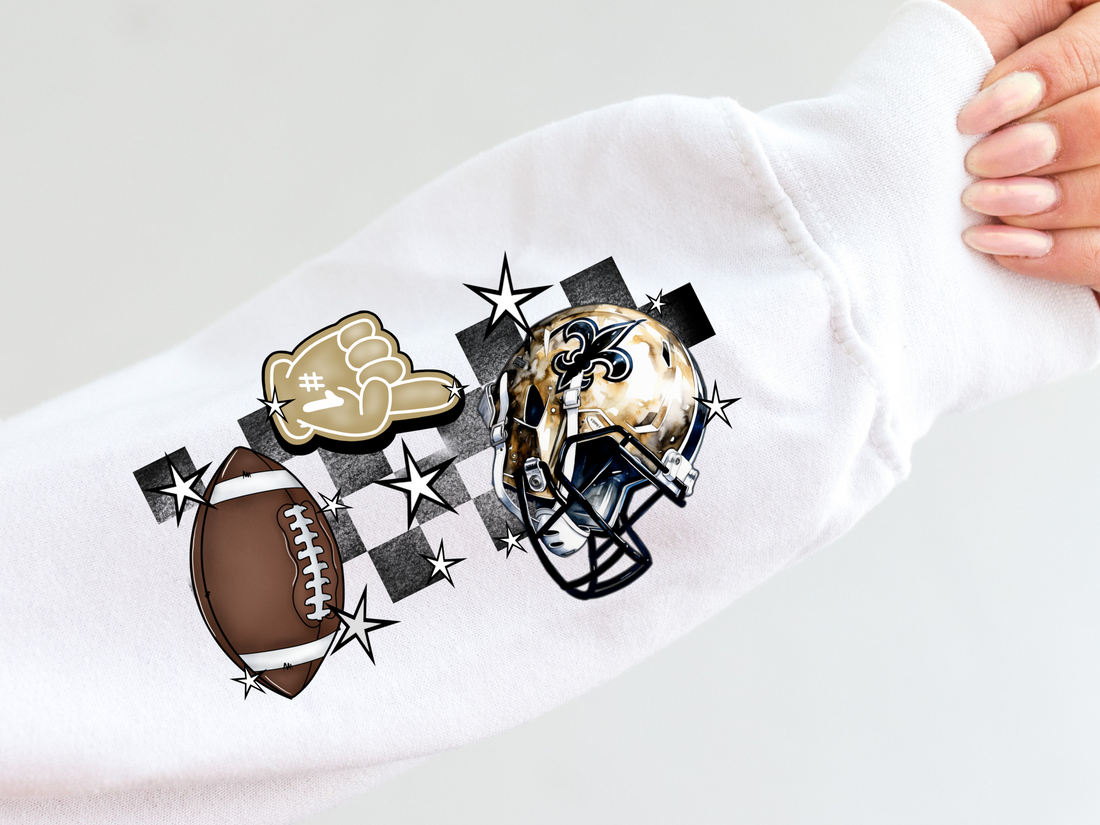 Saints helmet, foam finger, football and black checkered sleeve