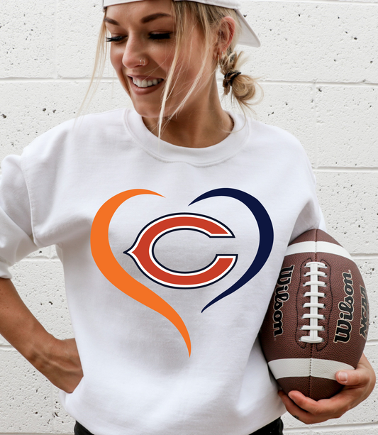 Blue/orange heart with Chicago bear logo inside