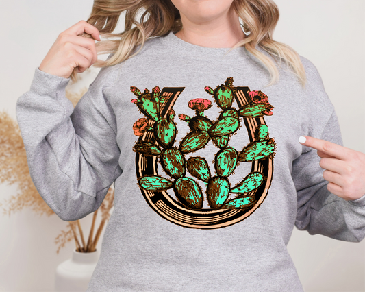 Cactus inside a horseshoe