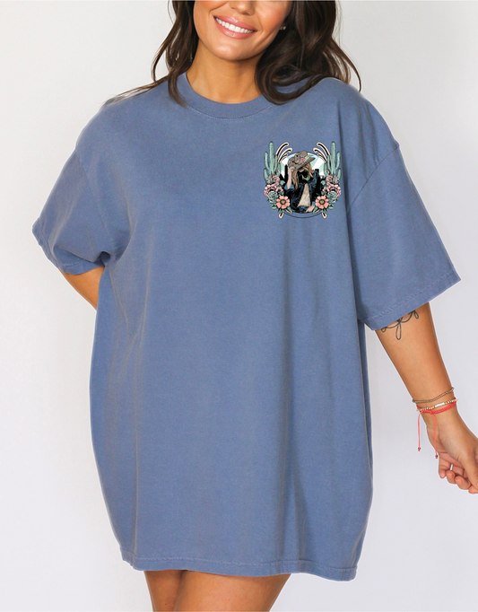 Cowgirl surrounded by flowers and cacti