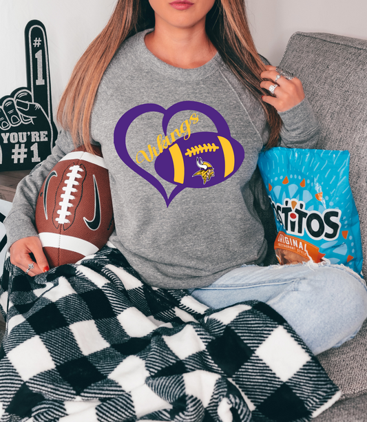 Vikings with football inside purple heart
