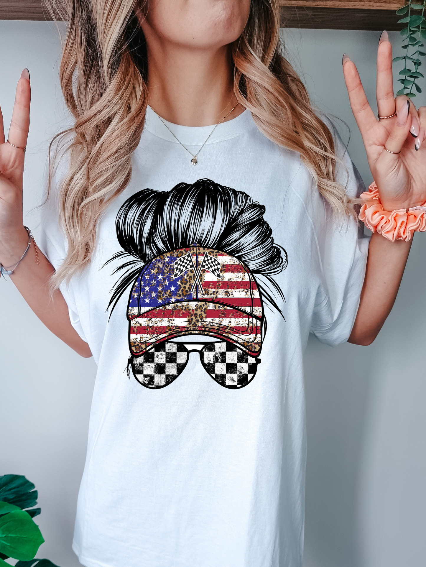 white/black checkered and American flag glasses and hat