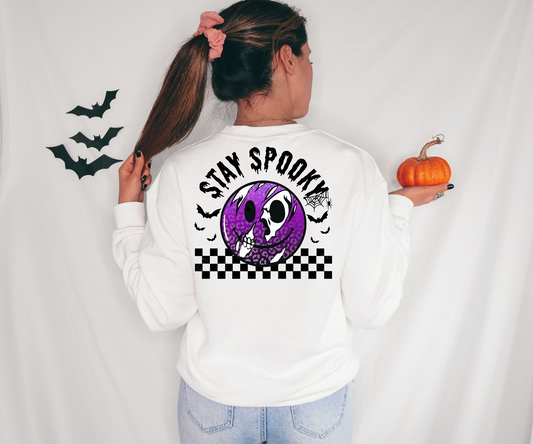 Stay spooky, white and purple skull smiley