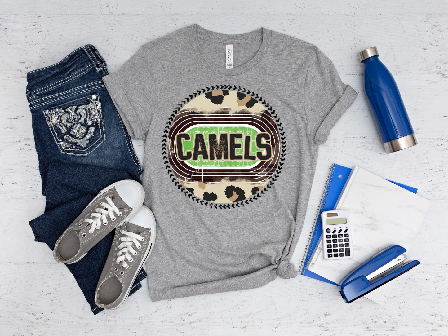 Camels, cheetah print and stadium