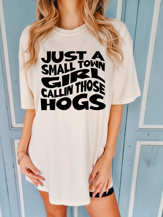 Just a small town girl callin those hogs