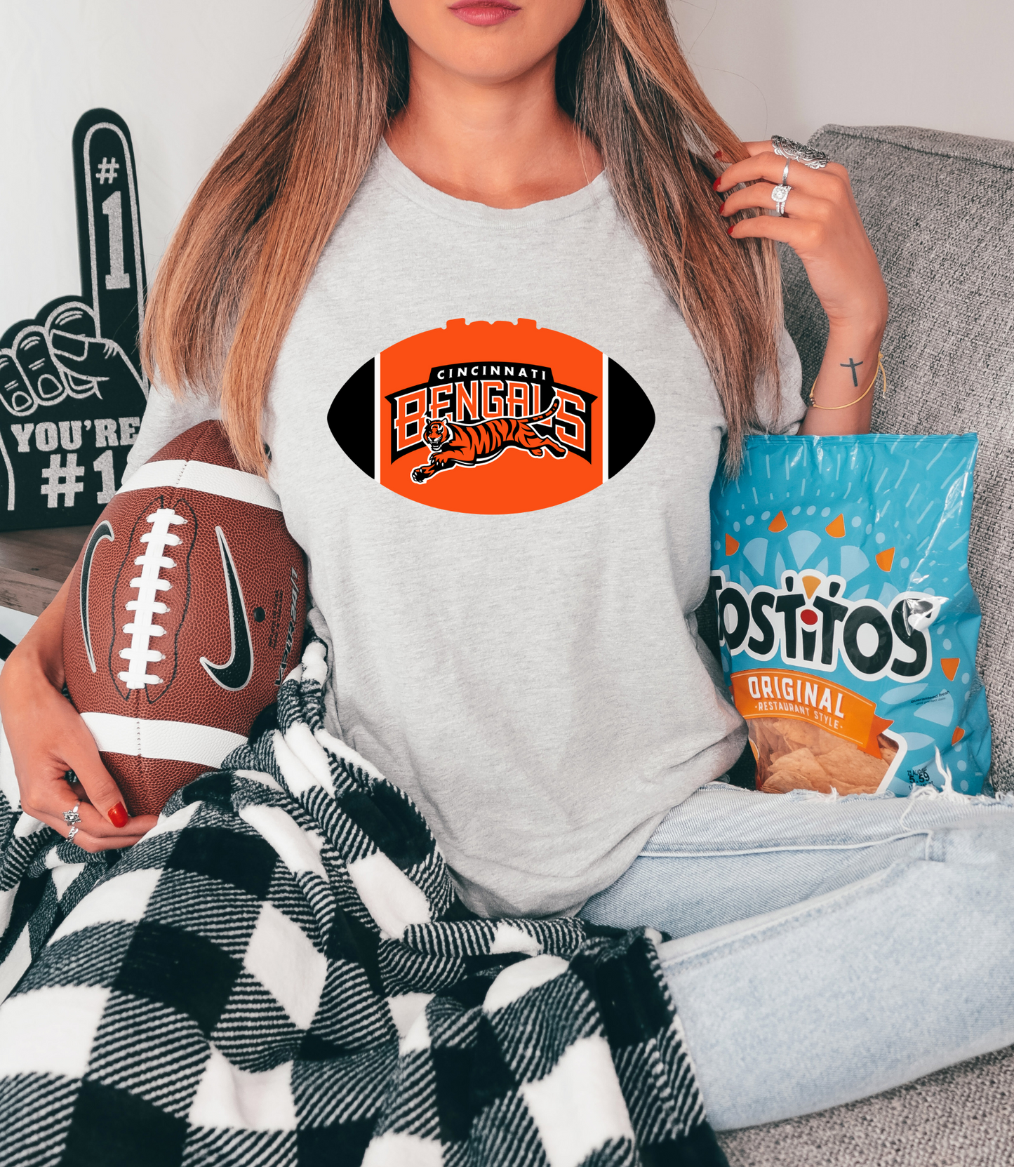 Cincinatti Bengal's with mascot inside football