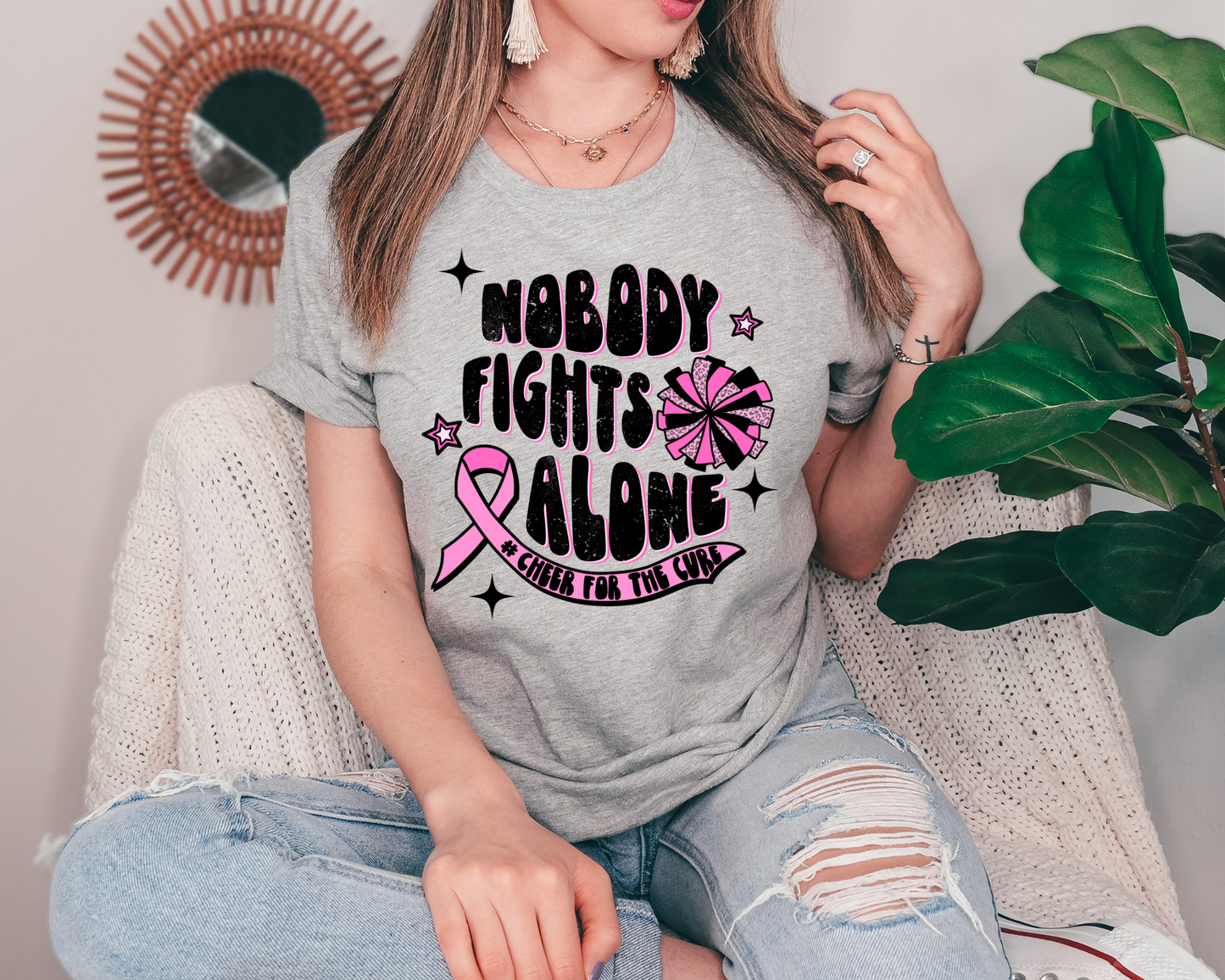 Nobody fights alone #cheer for the cure
