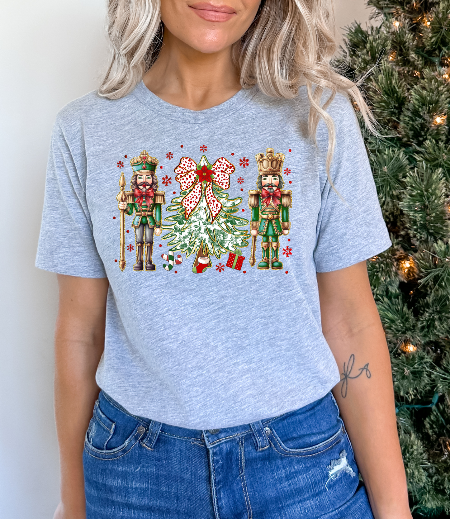 Nutcrackers And Christmas Tree And Bow