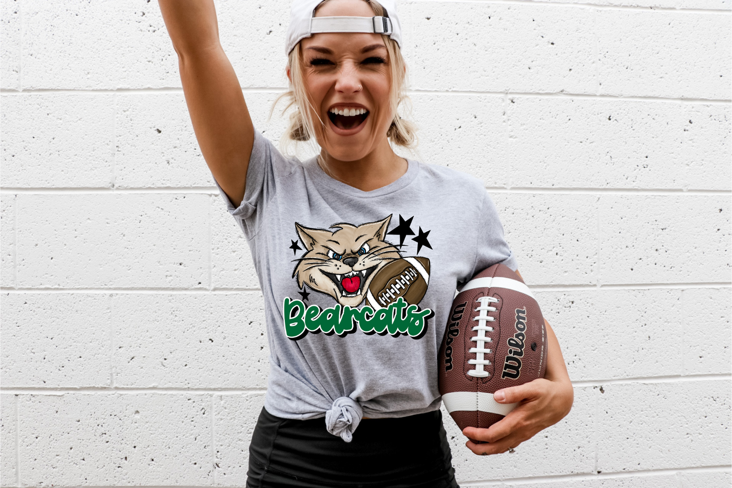 Bearcats with mascot- green letters