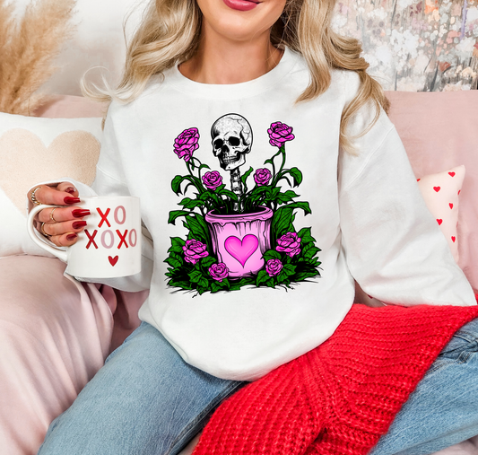 Skeleton In Heart Pot With Flowers