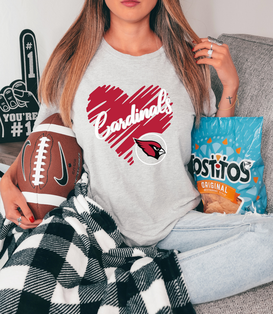 Cardinals inside scribbled red heart - white letters