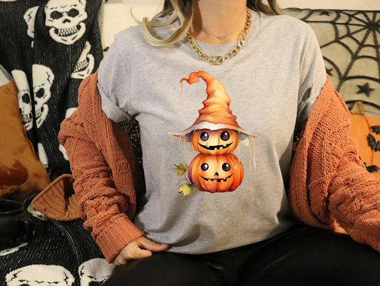 Jack-o-lanterns in orange witch hat