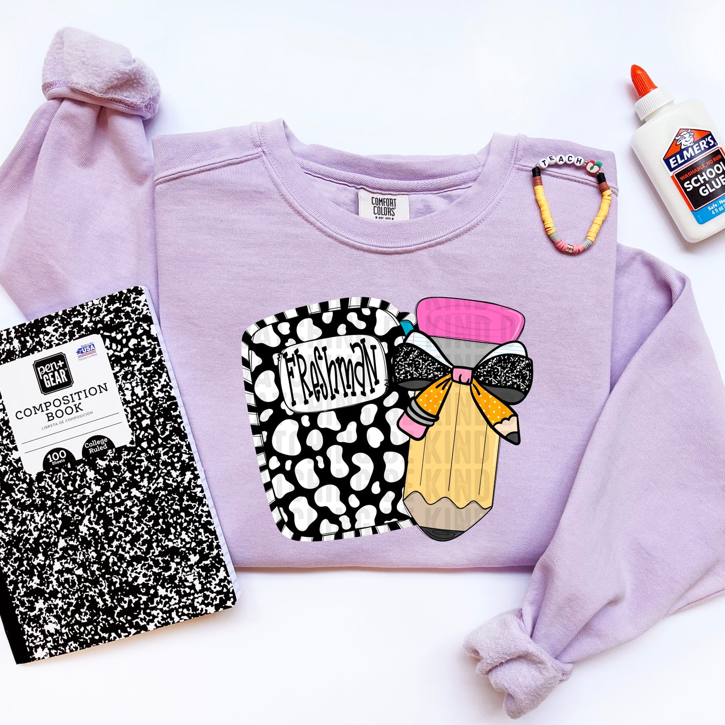 Freshman Pencil and notebook