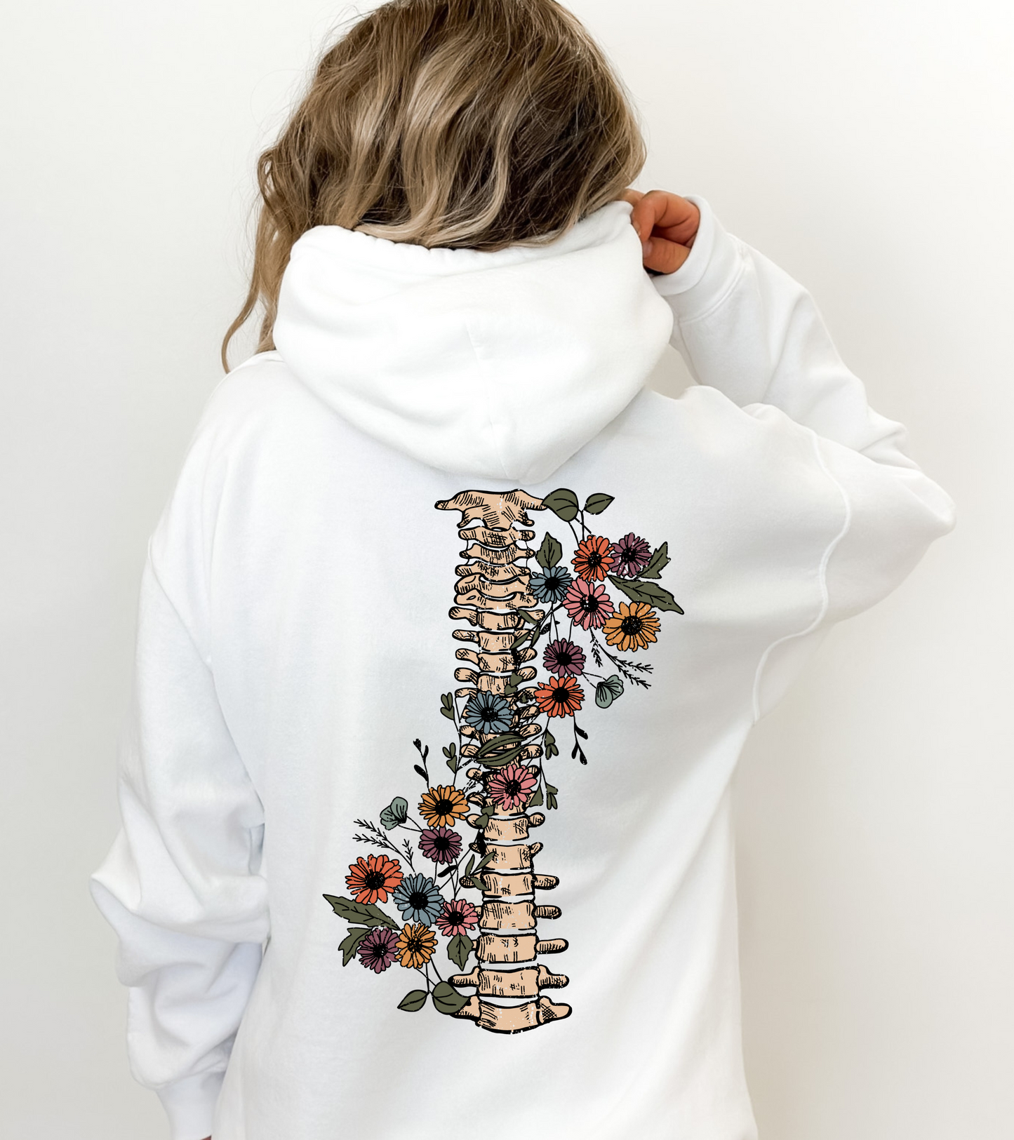 Spine wrapped in flowers