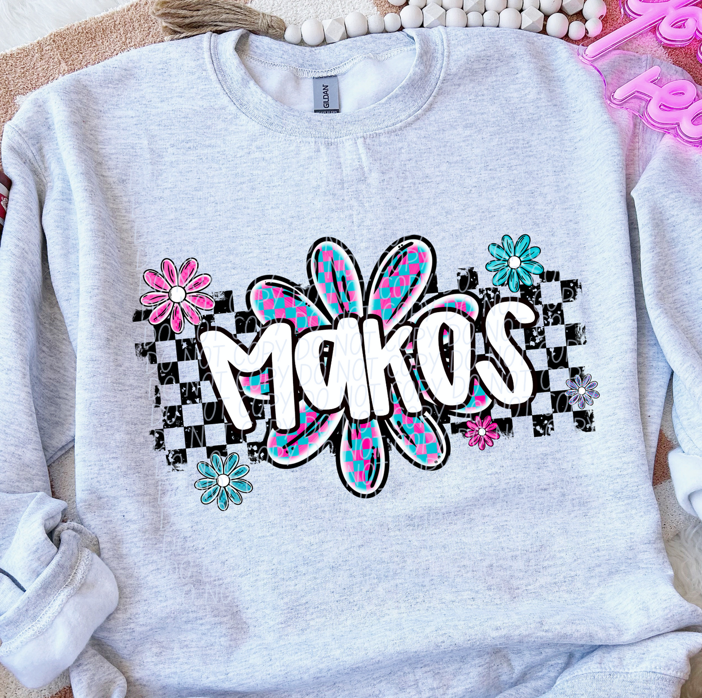 Makos (checker flower mascots)