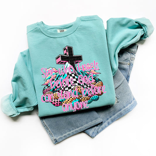 She who kneels before God