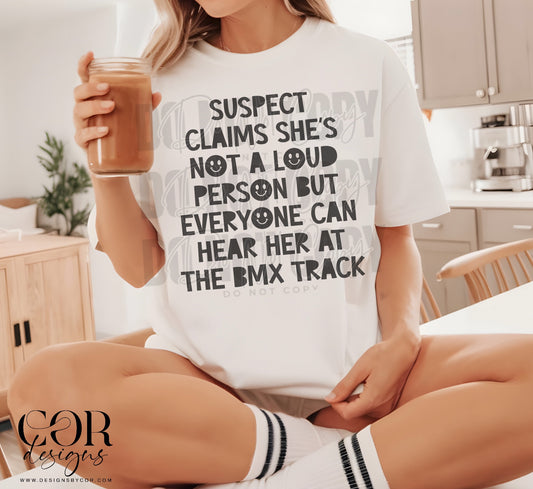 Suspect claims she's not a loud person but everyone can hear her at the bmx track